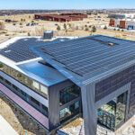 Namaste Solar attaches vertical PV array to office building with S-5! mounts